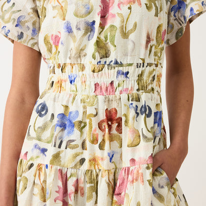 A closeup of the Nancybird Lola Dress in Watercolour Collage on a model