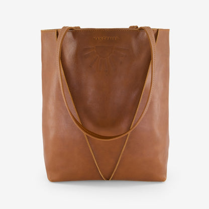 The Nancybird Tri Tote in Tobacco on a grey background