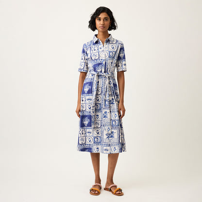 The Nancybird Vera Short Sleeve Dress in Lyon Tile on a model paired with sandals