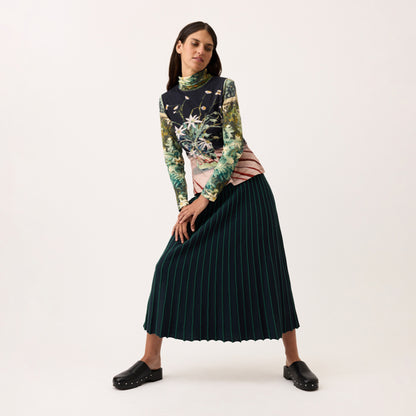 The Nancybird Aine Skirt in Foliage on a model on a blank background