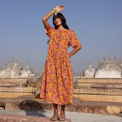 The Nancybird Alba Dress in Sunset Floral on a model in India