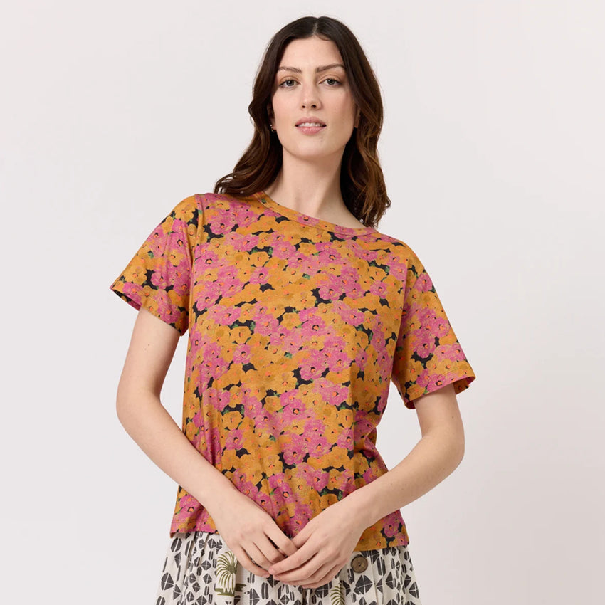 Nancybird Apollo Tee in Sunset Floral on a model on a blank background