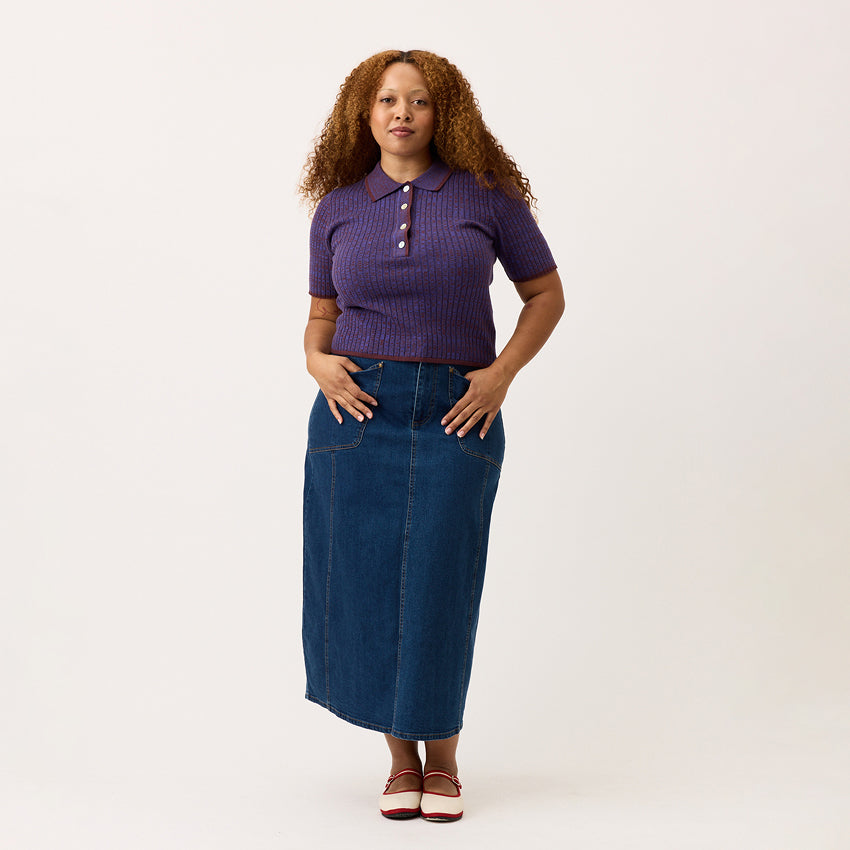 The Nancybird Franny Skirt in Denim on a model with a blank background