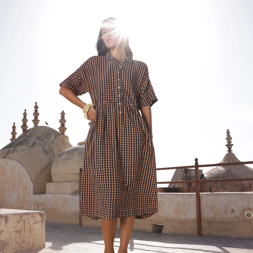 The Nancybird Luma Shirt Dress in Jaipur Check on a model with sun shinning