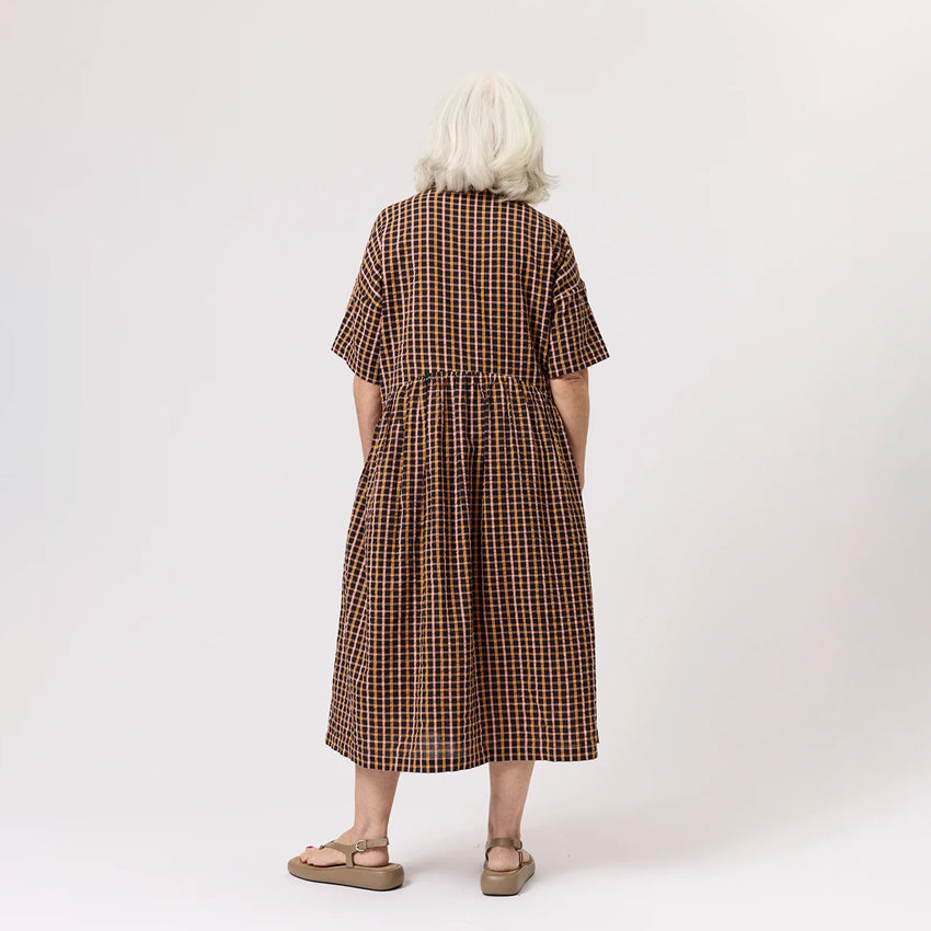 The back of the Nancybird Luma Shirt Dress in Jaipur Check on a model on a blank background