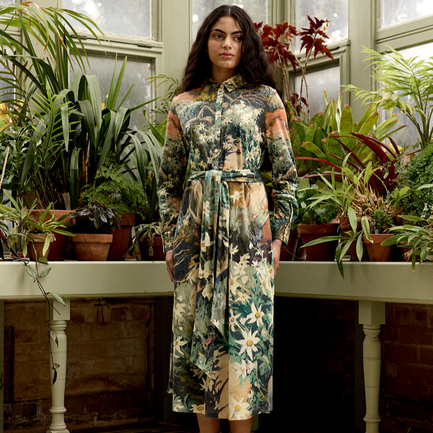 The Nancybird Mera Shirt Dress in Flannel Flower on a model in a conservatory  