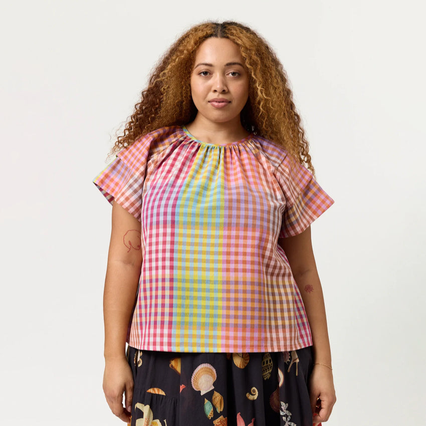 The Nancybird Micci Top in Sunrise Check on a model on a blank background