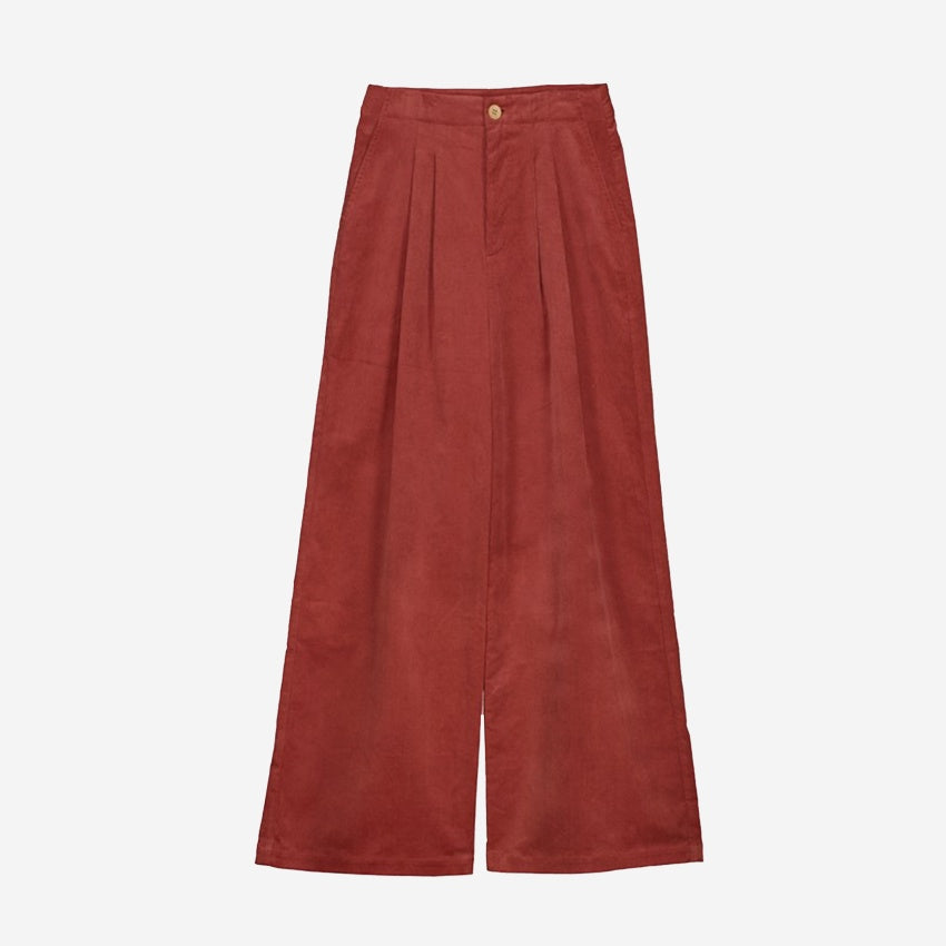 The Nancybird Niko Pants in Spice on a blank background