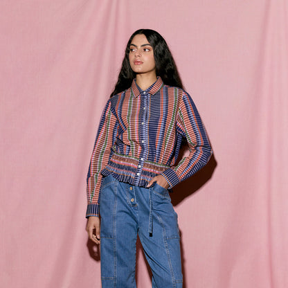 The Nancybird Orla Shirt in Line Check on a model on a pink background