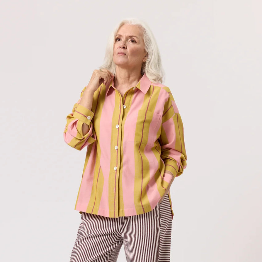 The Nancybird Sabine Shirt in Dusk Stripe on a model on a blank background