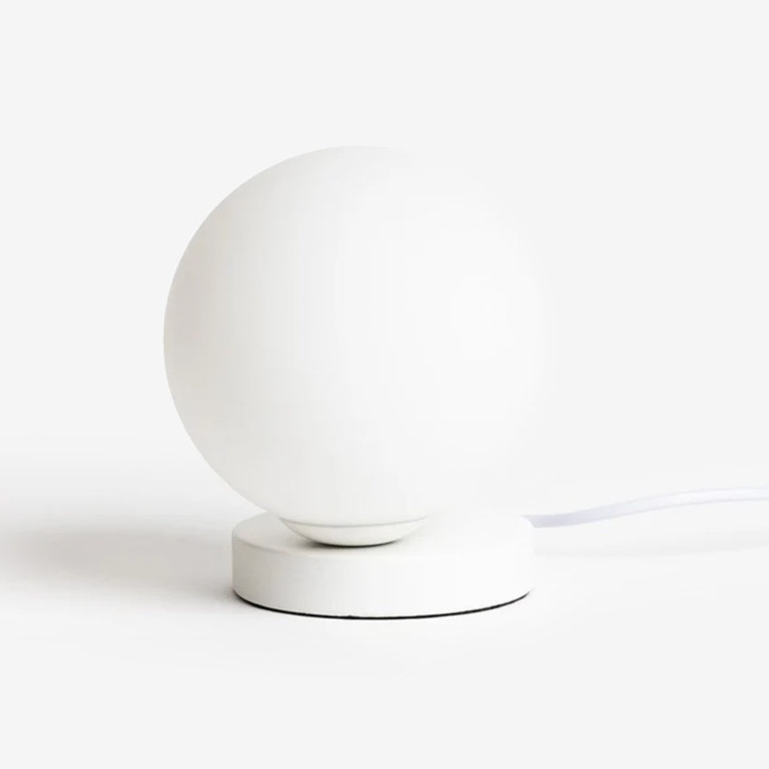 The Ned Collections Yuri Table Lamp turned off on a blank background