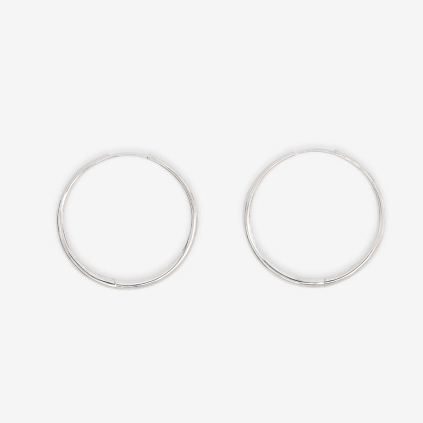The Nina Gordon Large Momento Hoops in Sterling Silver