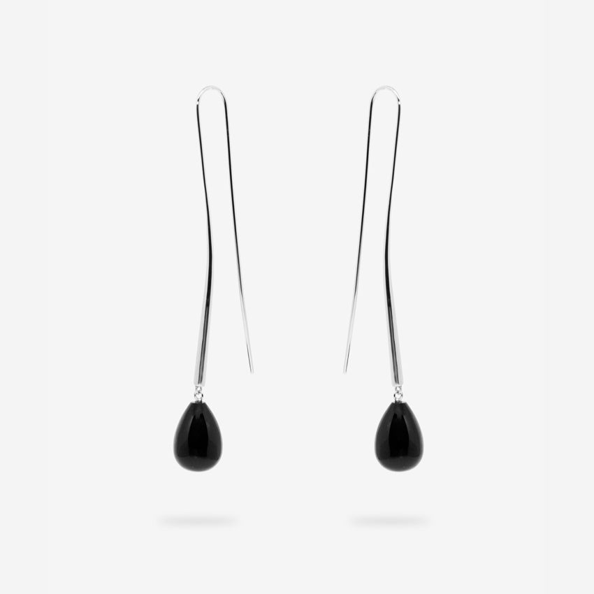 The Nina Gordon Cusp Onyx Earrings on a blank background