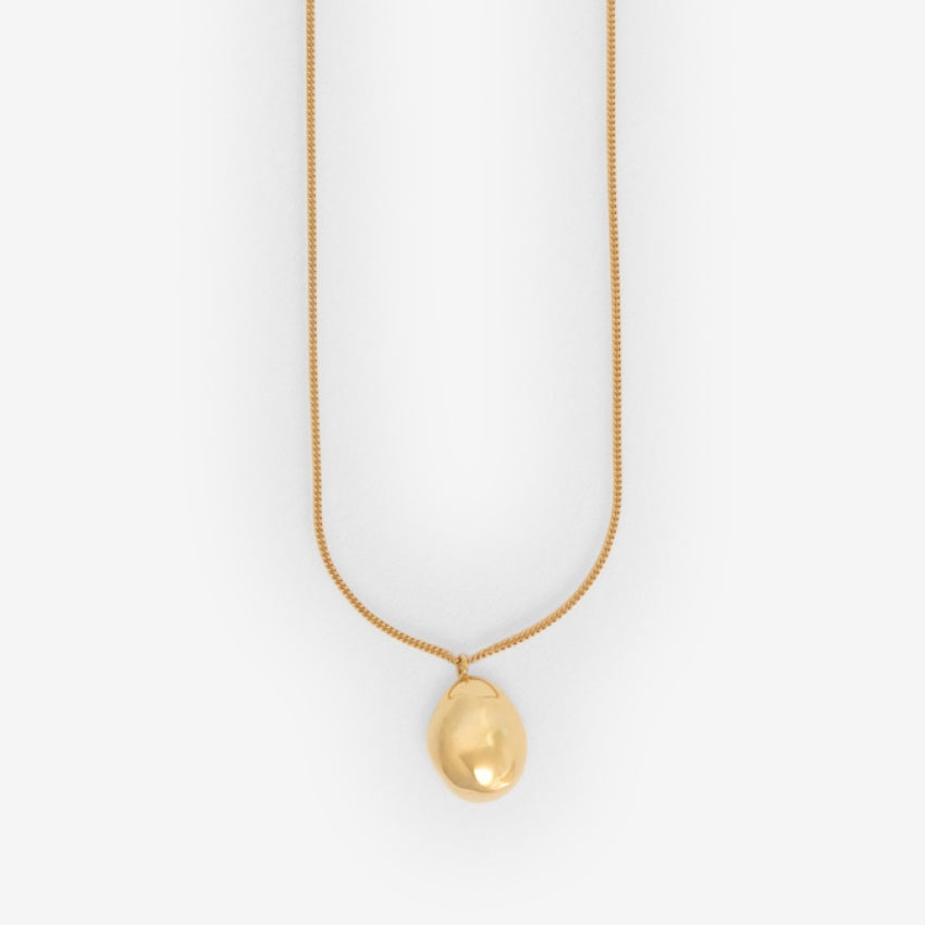 The Nina Gordon Drop Necklace in Gold Vermeil on a blank background