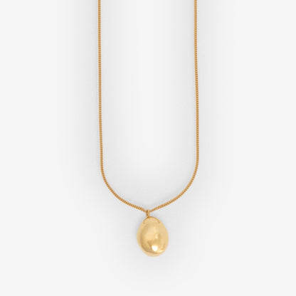 The Nina Gordon Drop Necklace in Gold Vermeil on a blank background