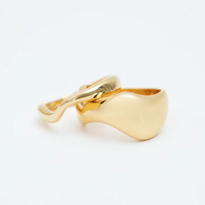 The Nina Gordon Jean Ring Set in Gold on a blank background