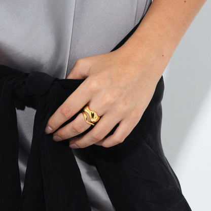 The Nina Gordon Jean Ring Set in Gold on a models finger