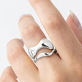 The Nina Gordon Jean Ring Set in Silver on a models finger