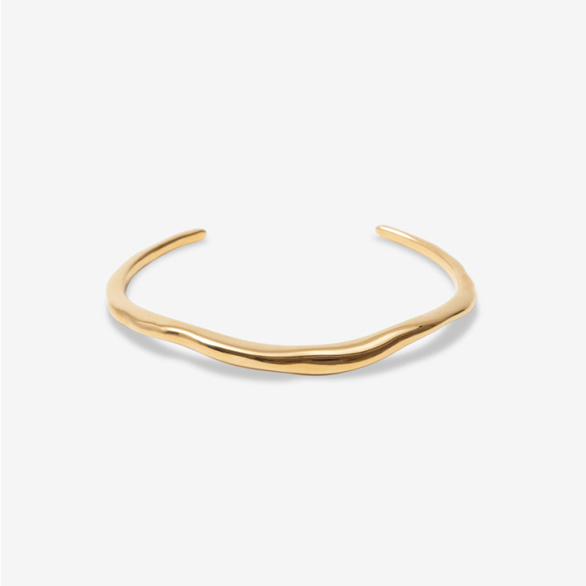 The Nina Gordon Lucid Wrist Cuff in Gold on a blank background