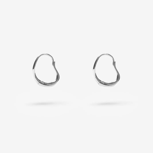 The Nina Gordon Ventee Hoops in Silver on a blank background