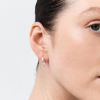 The Nina Gordon Version Hoops in Sterling Silver on a model