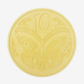 The One Lane Bridge 10 Cent Candy Coin in yellow on a blank background