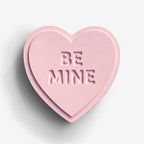 The One Lane Bridge "Be Mine" Sweet Heart in pink on a blank background