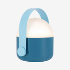 The Remember Light Ole Lamp in Blue on a grey background