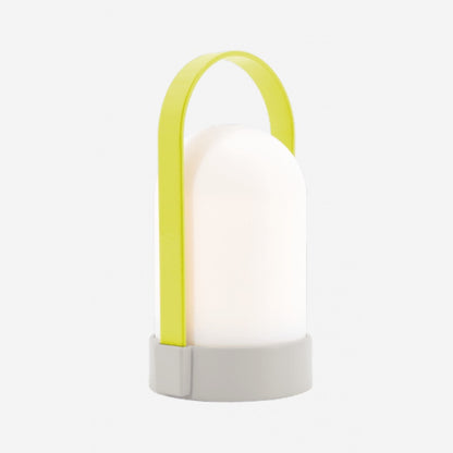 The Remember UTI Piccolo Lamp in Yellow on a blank background