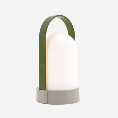 The Remember UTI Piccolo Lamp in Green on a blank background