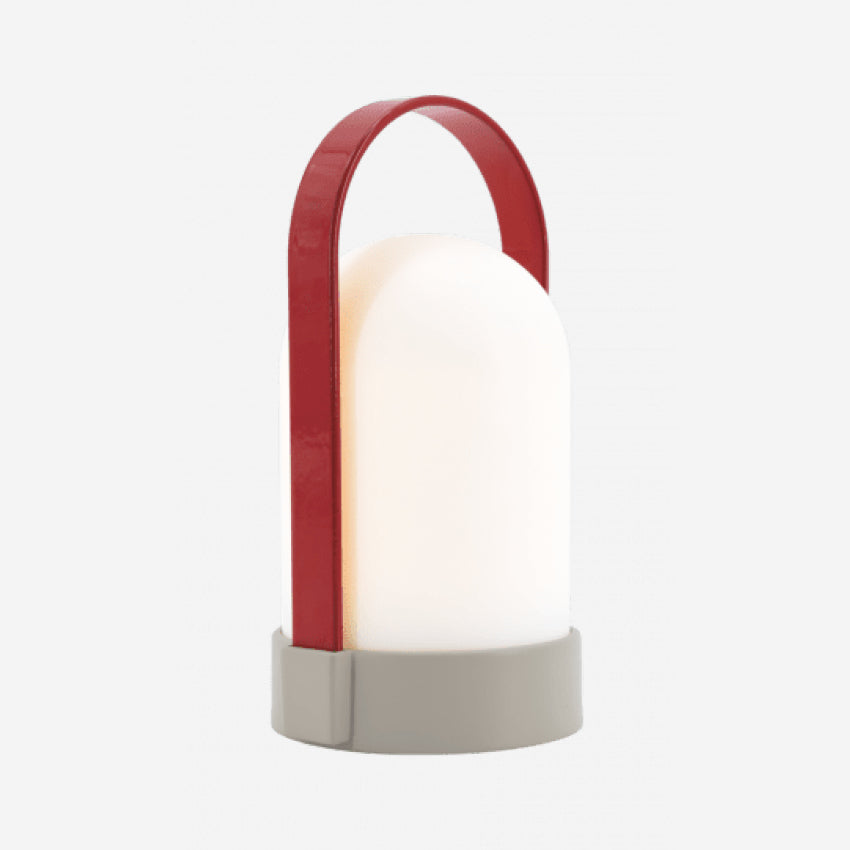 The Remember UTI Piccolo Lamp in Red on a blank background