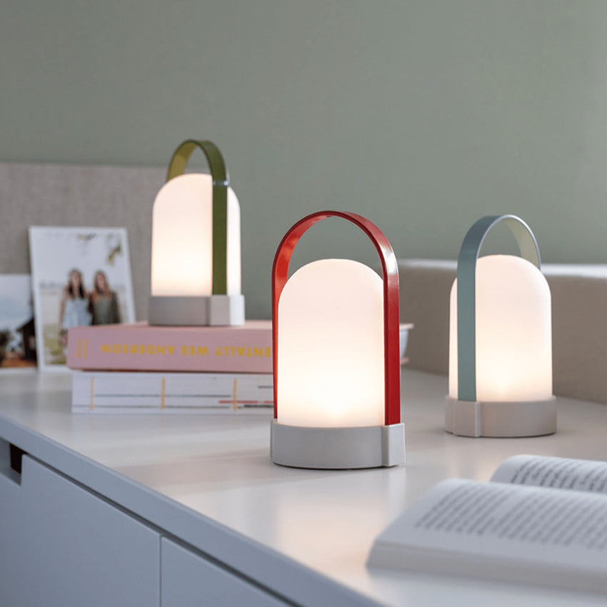 Three of the Remember UTI Piccolo Lamps on a white desk