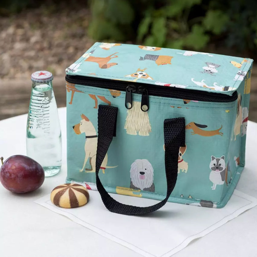 The Rex London Best In The Show Insulated Lunch Bag on a table with snacks