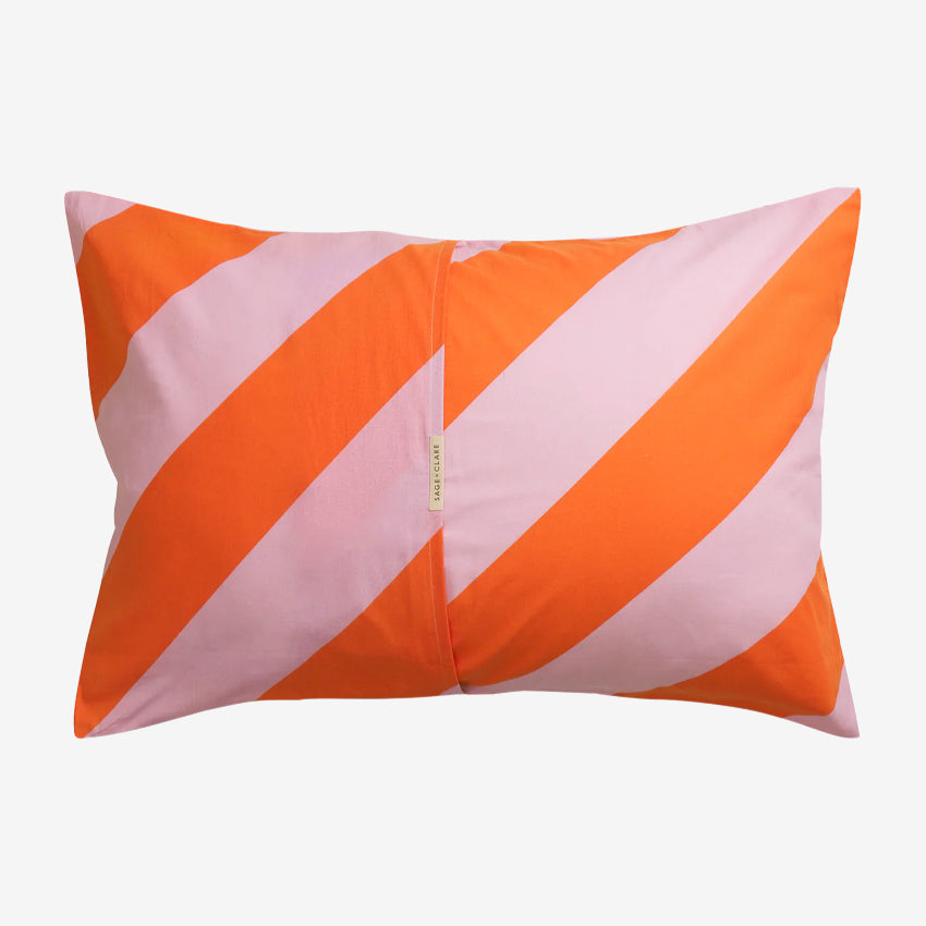 The back of the Sage x Clare Clarice Cotton Pillowcase on a grey background