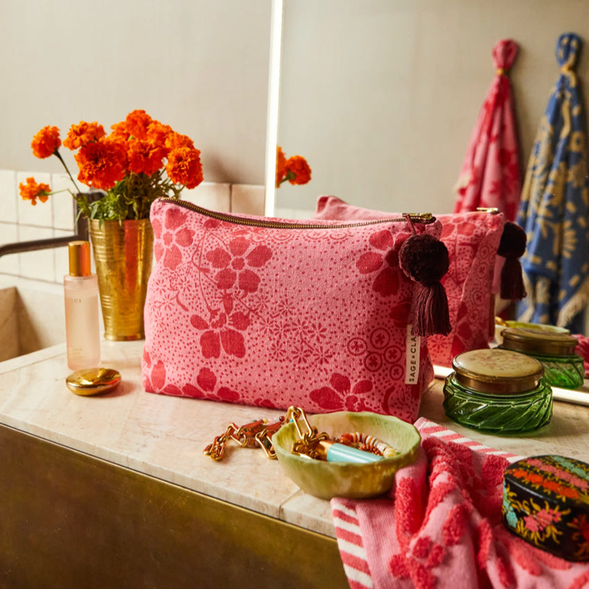 Sage x Clare Salina Cosmetic Bag on a bathroom vanity