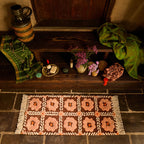 Sage x Clare Billy Bath Runner on tiled floor with flowers and other accessories around it