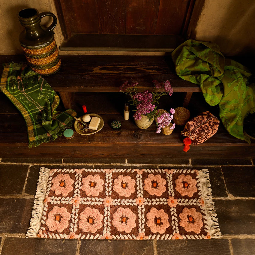 Sage x Clare Billy Bath Runner on tiled floor with flowers and other accessories around it
