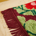 A close up of the Sage x Clare Genevieve Bath Mat in Mahogany