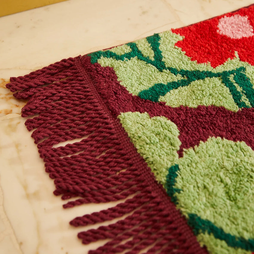 A close up of the Sage x Clare Genevieve Bath Mat in Mahogany