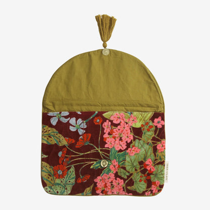 The Sage x Clare Genevieve Velvet Clutch open on a blank background