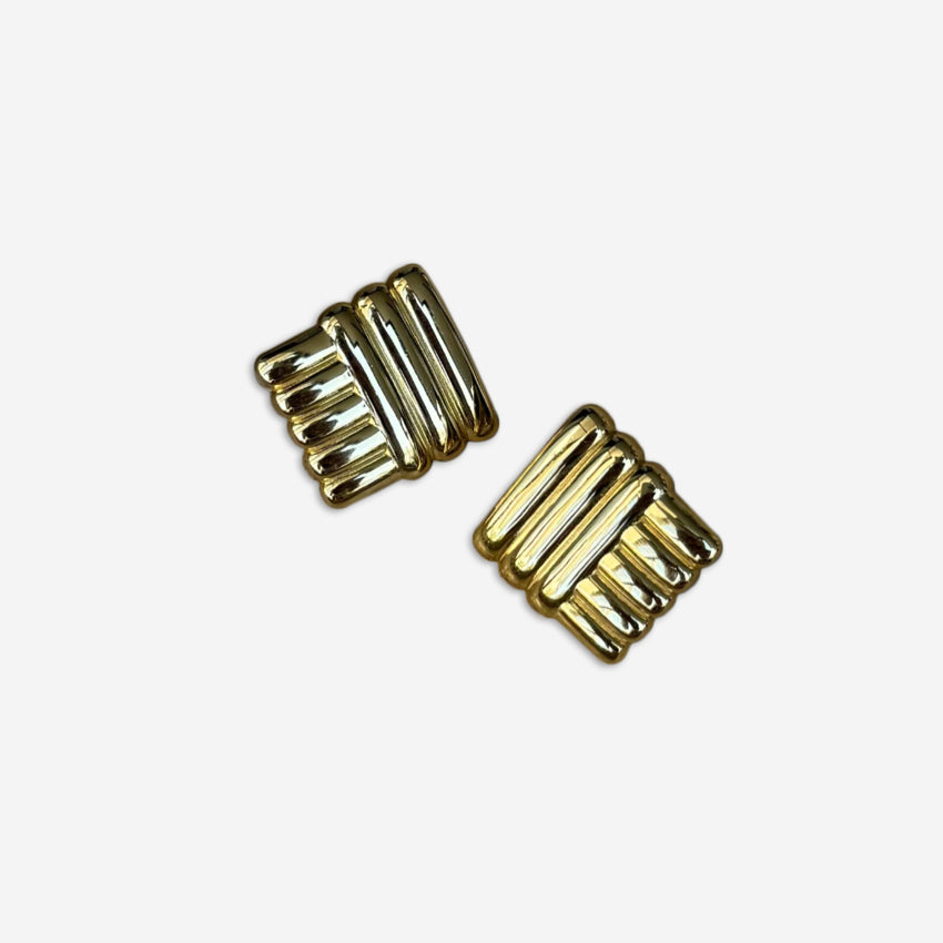 The Silver Linings Collective Di Earrings in Gold on a blank background