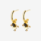 The Silver Linings Collective Monarchy Hoops in Gold on a blank background