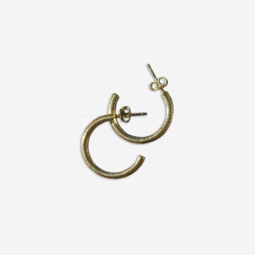 The Silver Linings Collective Navy Hoops in Gold on a blank background