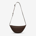 The Status Anxiety Glued To You Bag in Cocoa on a blank background