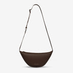 The Status Anxiety Glued To You Bag in Cocoa on a blank background