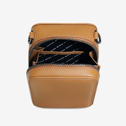 A top view of the Status Anxiety Good Life Bag in Tan open on a blank background