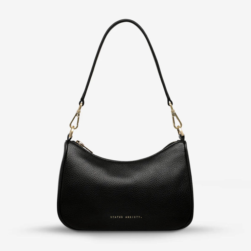 The Status Anxiety Look Both Ways in Black and Brush Gold on a blank background 