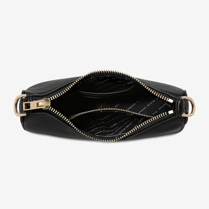 An inside view of the Status Anxiety Look Both Ways in Black and Brush Gold on a blank background 