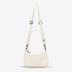 The Status Anxiety Look Both Ways Bag in Chalk on a grey background