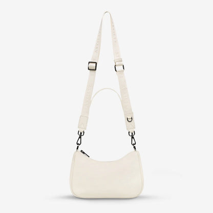 The Status Anxiety Look Both Ways Bag in Chalk on a grey background